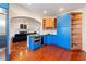 Well lit kitchen with stainless steel appliances, tile floors and view into living room at 4086 Haverhill Dr, Atlanta, GA 30342