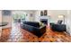 Living room with tile floors, fireplace and view into dining room at 4086 Haverhill Dr, Atlanta, GA 30342