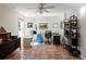 Bright home office with tile flooring, ceiling fan, natural light, and built-in shelving at 4086 Haverhill Dr, Atlanta, GA 30342