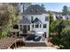 Rear exterior of home with deck, pergola, and backyard at 4086 Haverhill Dr, Atlanta, GA 30342