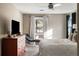 Cozy bedroom with hardwood floors, natural light, neutral color scheme, and an accent chair at , Tucker, GA 30084