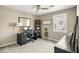 Bedroom featuring neutral paint, carpet flooring, ceiling fan, and work-from-home setup at , Tucker, GA 30084