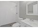 Clean bathroom with white subway tile, shower, toilet and vanity at 1664 Columbia Dr, Decatur, GA 30032