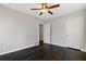 Bedroom with hardwood floors, ceiling fan and closet at 1664 Columbia Dr, Decatur, GA 30032