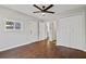 Hardwood floor bedroom with double door closet and access to hallway at 1664 Columbia Dr, Decatur, GA 30032