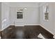 Spacious dining room with hardwood floors and large windows at 1664 Columbia Dr, Decatur, GA 30032