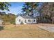 Charming ranch home with a spacious front yard at 1664 Columbia Dr, Decatur, GA 30032