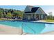 Community swimming pool with adjacent pool house at 3573 Stonebranch Ln, Loganville, GA 30052