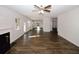 Modern kitchen with stainless steel appliances, granite countertops, an island, and hardwood floors at 3573 Stonebranch Ln, Loganville, GA 30052