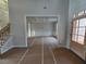 Formal dining room with coffered ceiling and hardwood floors at 7449 Waterview Cv, Douglasville, GA 30135