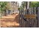 Charming dog park featuring wood fencing, shade trees, and picnic benches for a fun outdoor experience at 951 Glenwood Se Ave # 1201, Atlanta, GA 30316