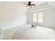 Spacious main bedroom with a tray ceiling and large windows providing natural light at 1275 Pj East Rd, Covington, GA 30014