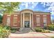 Brick building with columns and steps at 1275 Pj East Rd, Covington, GA 30014