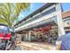 Monroe Mercantile Co. storefront, inviting retail space with large windows and outdoor seating at 1275 Pj East Rd, Covington, GA 30014