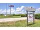 Fox Winery sign with vineyard view; open Wed-Sat 10am-6pm, Sun 1pm-6pm at 1275 Pj East Rd, Covington, GA 30014