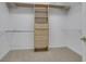 Walk-in closet with ample shelving and hanging space at 1215 Wynridge Xing, Alpharetta, GA 30005