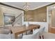 Bright dining room with a large wooden table and chandelier at 1215 Wynridge Xing, Alpharetta, GA 30005