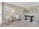 Neutral-toned home office with a desk, chairs, and natural light at 1215 Wynridge Xing, Alpharetta, GA 30005