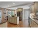 Eat-in kitchen featuring an island and stainless steel appliances at 1215 Wynridge Xing, Alpharetta, GA 30005