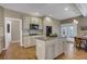 Well-equipped kitchen with an island and hardwood floors at 1215 Wynridge Xing, Alpharetta, GA 30005