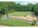 Community playground with play equipment at 1215 Wynridge Xing, Alpharetta, GA 30005