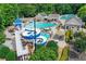 Community pool with water slide and lounge areas at 1215 Wynridge Xing, Alpharetta, GA 30005