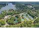 Aerial view of community tennis courts and surrounding landscape at 1215 Wynridge Xing, Alpharetta, GA 30005