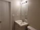 Simple bathroom with vanity sink and medicine cabinet at 2043 Laird Rd, Hiram, GA 30141