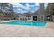 Inviting community pool with lounge chairs and clubhouse in background at 2657 Lenox Ne Rd # 79, Atlanta, GA 30324