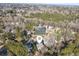 Aerial view highlighting home's location in a wooded area at 4392 Overlook Dr, Acworth, GA 30101