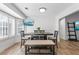 Bright dining area with table, bench, and bay window at 4392 Overlook Dr, Acworth, GA 30101