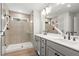 Modern bathroom with double vanity and large shower at 731 Stickley Oak Way, Woodstock, GA 30189