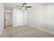 Bedroom featuring a ceiling fan and access to closet at 731 Stickley Oak Way, Woodstock, GA 30189