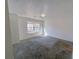 Large bedroom with plush carpet and ample natural light at 4222 High Park Ln, Atlanta, GA 30344