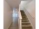 Bright and airy entryway with stairs leading to the second floor at 4222 High Park Ln, Atlanta, GA 30344