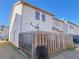 Home's back exterior with wooden fence at 4222 High Park Ln, Atlanta, GA 30344