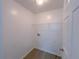 Laundry room with vinyl flooring and shelving at 4222 High Park Ln, Atlanta, GA 30344