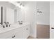 Bathroom with double vanity and access to bedroom at 89 Batten Board Way, Woodstock, GA 30189