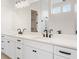 Bathroom with double vanity and quartz countertop at 89 Batten Board Way, Woodstock, GA 30189