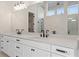 Bathroom with double vanity and large mirror at 89 Batten Board Way, Woodstock, GA 30189