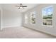 Bright and spacious bedroom with three large windows at 89 Batten Board Way, Woodstock, GA 30189