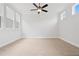 Spacious bedroom with carpet and ceiling fan at 89 Batten Board Way, Woodstock, GA 30189