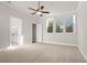 Bright bedroom with carpet, ceiling fan and en-suite bathroom at 89 Batten Board Way, Woodstock, GA 30189