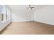 Spacious bedroom with hardwood floors and abundant natural light at 89 Batten Board Way, Woodstock, GA 30189