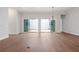 Dining room with hardwood floors and sliding glass doors to patio at 89 Batten Board Way, Woodstock, GA 30189