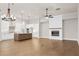 Bright and airy living room with hardwood floors and fireplace at 89 Batten Board Way, Woodstock, GA 30189