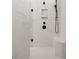 Contemporary shower with marble-look tile and black fixtures at 89 Batten Board Way, Woodstock, GA 30189