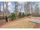 Fenced backyard with patio and mature trees at 236 Hickory Commons Way, Canton, GA 30115