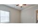 Bright bedroom with ceiling fan and window blinds at 236 Hickory Commons Way, Canton, GA 30115