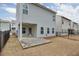 Gray house exterior with backyard patio at 236 Hickory Commons Way, Canton, GA 30115